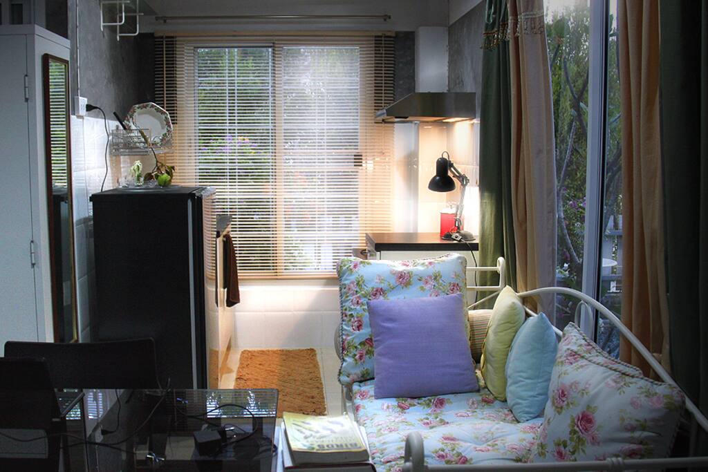 daybed and kitchen corner