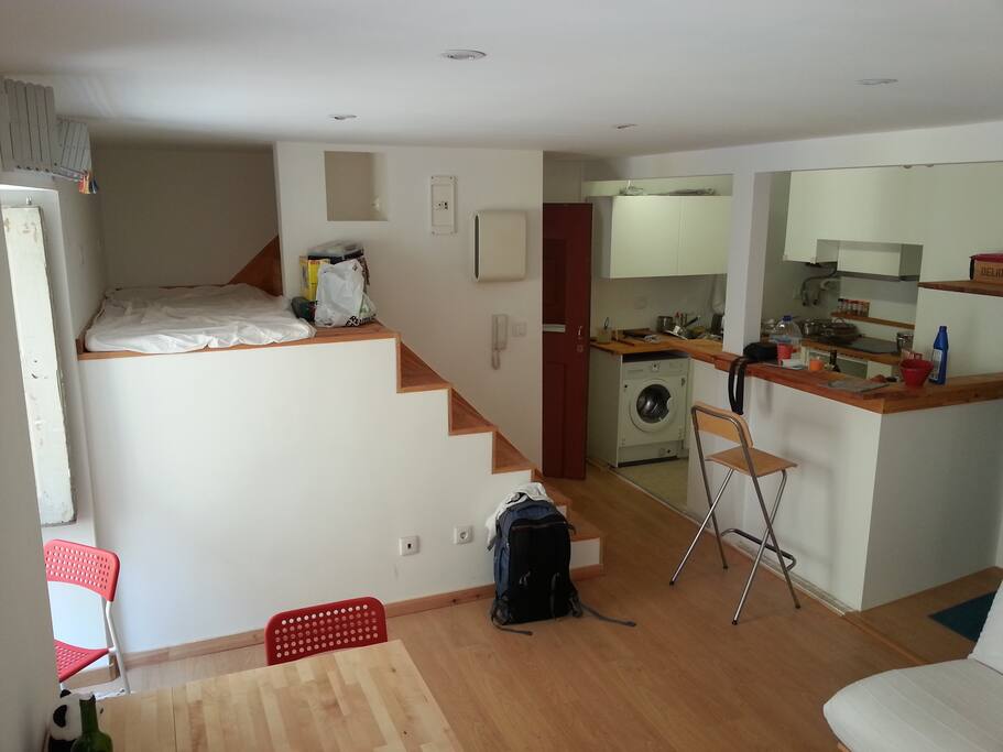 The third bed on the left and the open kitchen on the right, seen from the living room