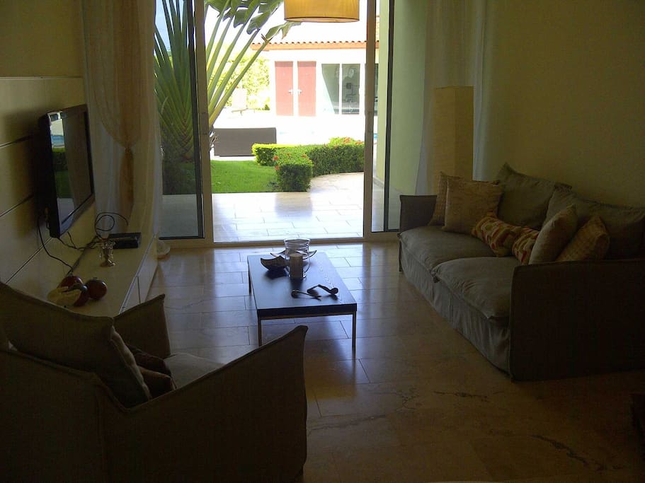 Modern living room with HD flat-screen.