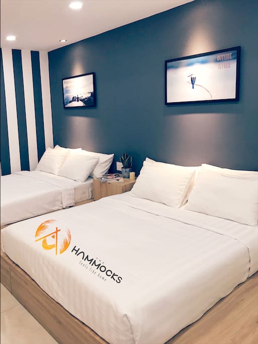 2 Queen Size Mattresses with high-quality bedding.