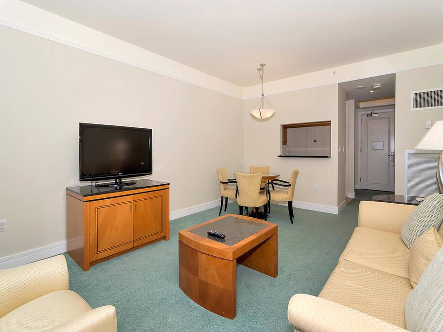 Flat screen TV with free Cable service.