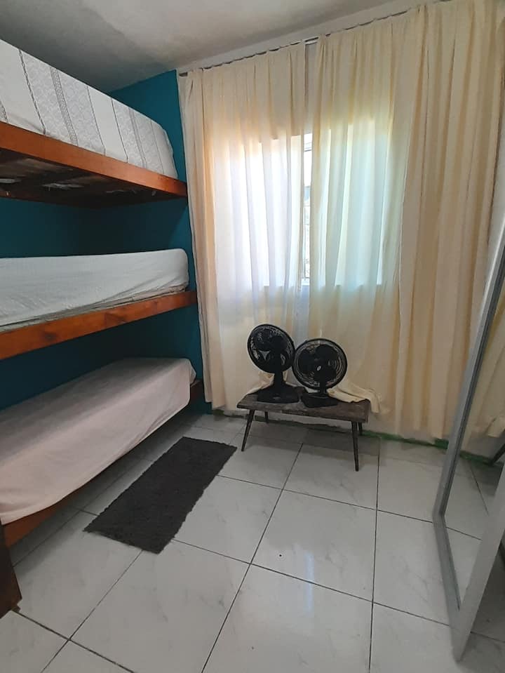 In the rooms we have a rustic wooden triliche planned, with a side staircase. Lots of ventilation in the room a thick curtain and a 1.80 mirror