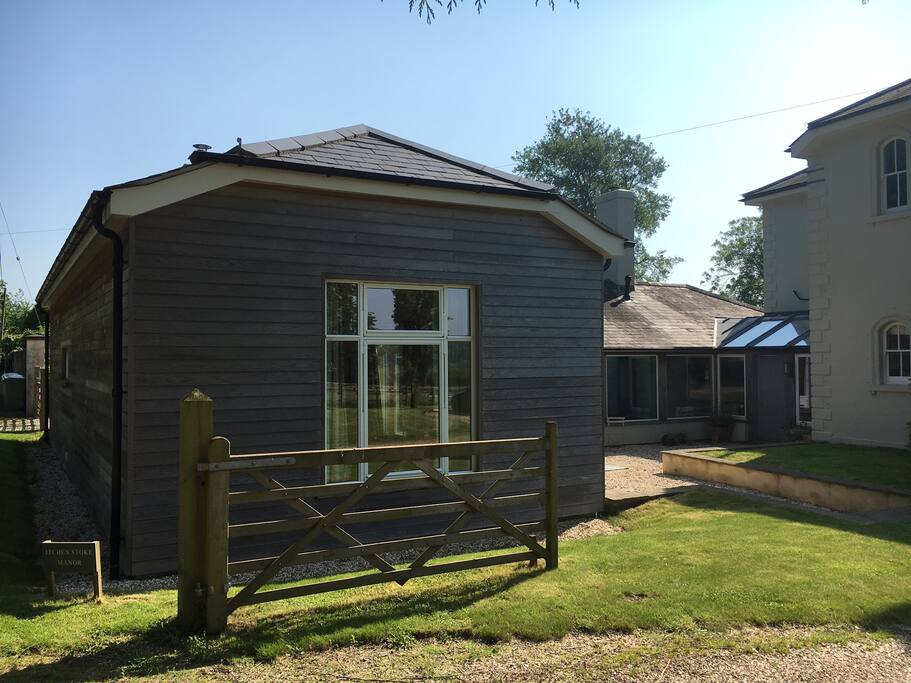 External shot of the sitting room - leading onto 'your private outdoor space'.