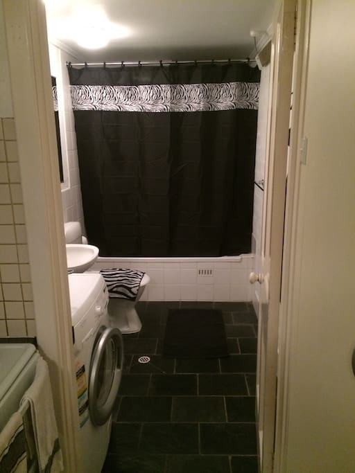 Shared bathroom/laundry.