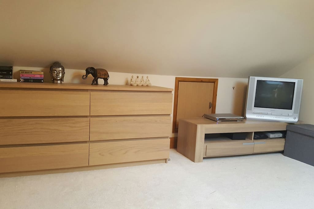 Clothes storage tv and dvd player.