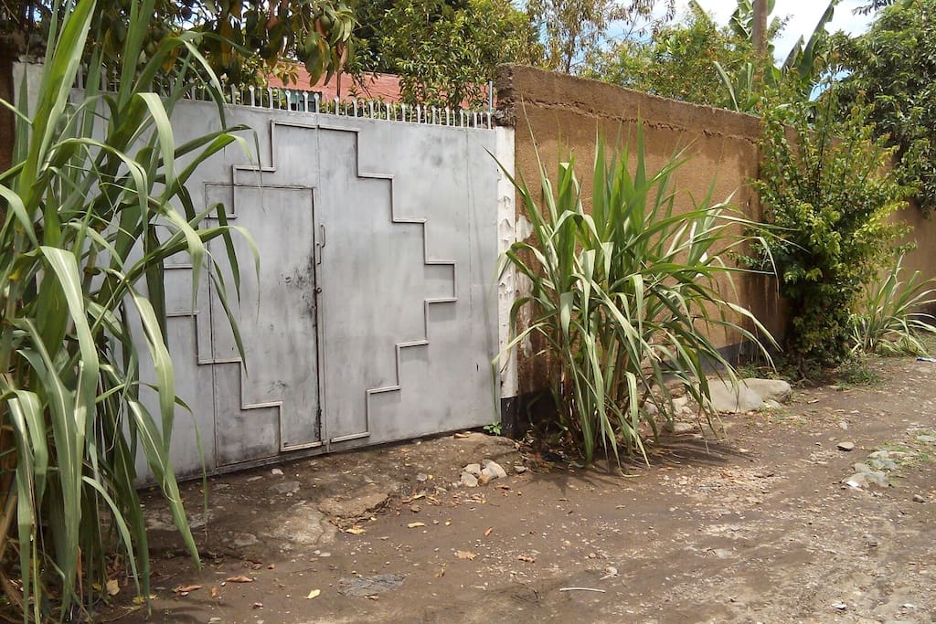 The entrance gate before the house.