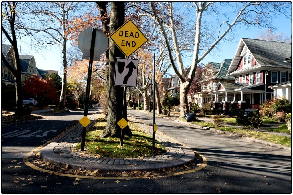 You can find the house to the left of this Dead End sign.