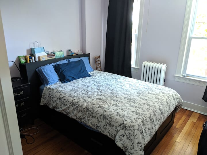 Main bedroom a.k.a. the purple room. That's a queen bed.