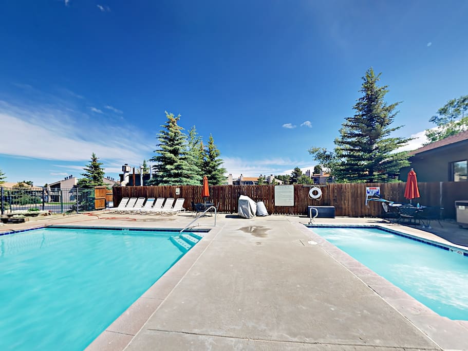 Relax around the outdoor heated pool and hot tub.