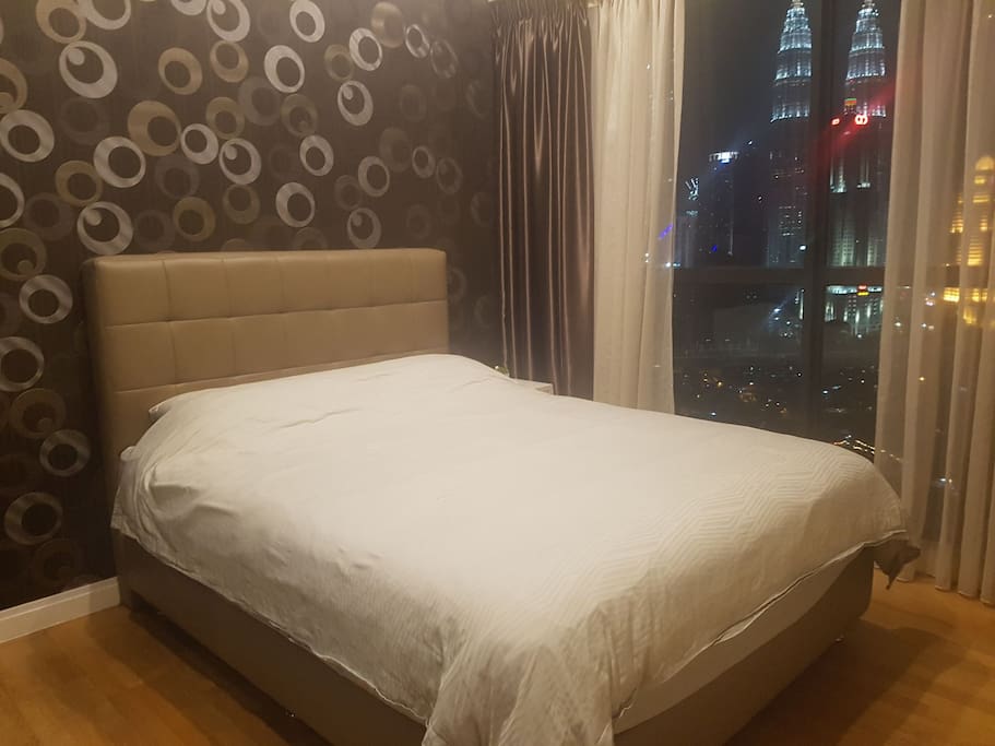 Comfortable Queen size bed with side table