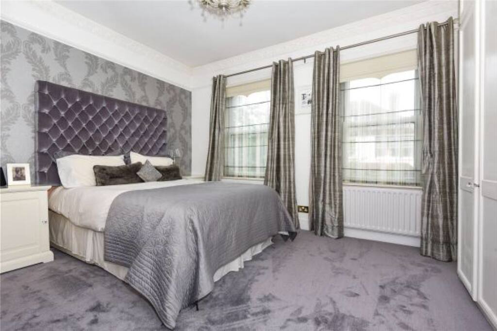 Master Bedroom with King bed, fitted wardrobes and drawers. Windows fitted with blackout blinds.