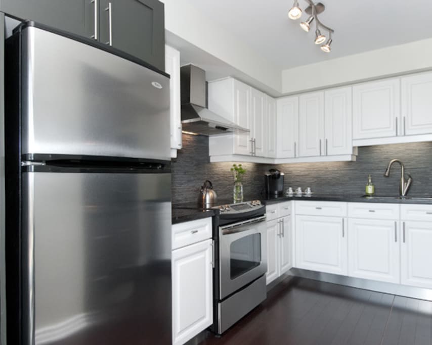 Open-plan kitchen with all amenities