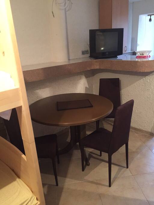 Kitchen table and TV 2
