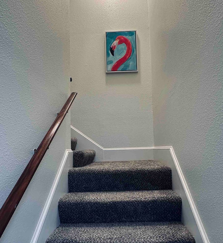 stairs leading to 2nd floor bedroom with 2 twin beds and full bathroom.