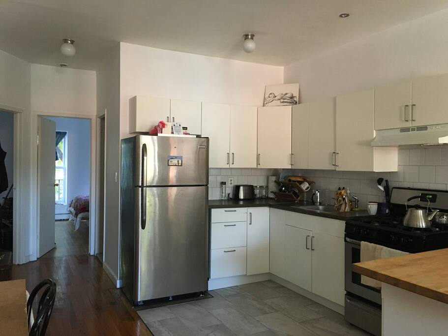 Open plan kitchen with large island for cooking