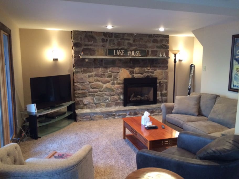 Lower level Game Room and living space with gas fireplace, 55in HDTV and Blue Ray with Smart access functions.