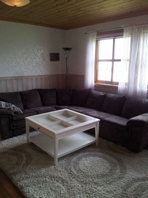 big lovely sofa at one end of the living room