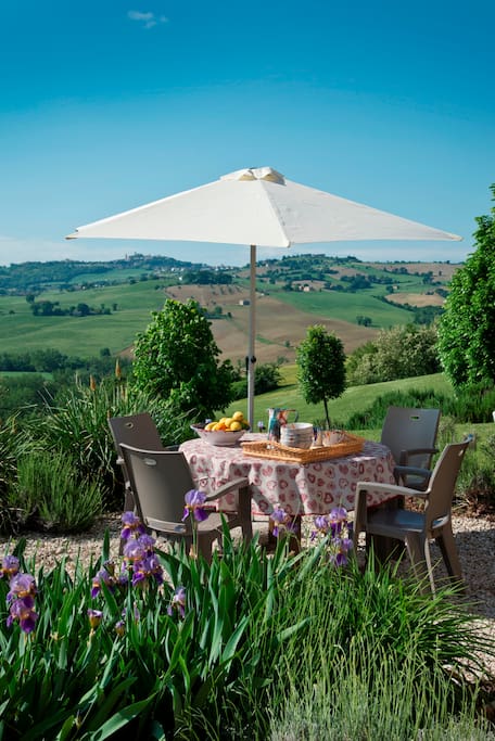Private gardens melt into the countryside.