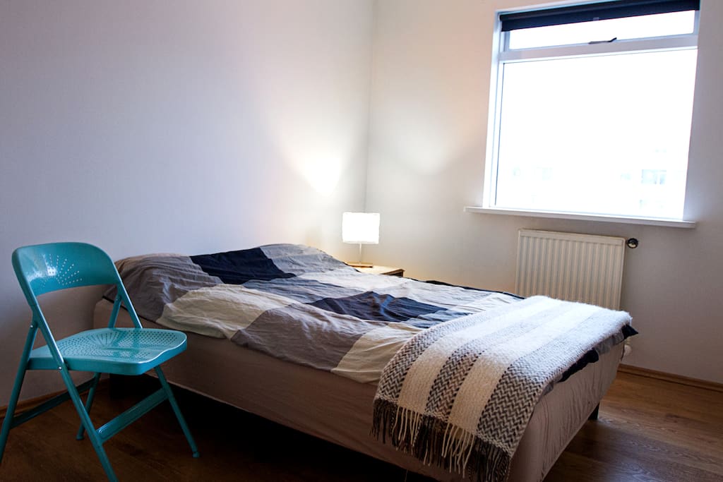 The other bedroom is the same size as the first one. Blackout blinds are a must in the summer.