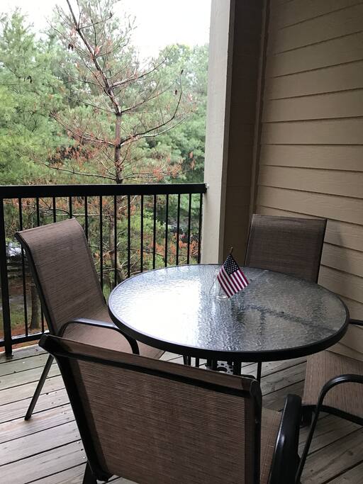 Private deck surrounded by trees