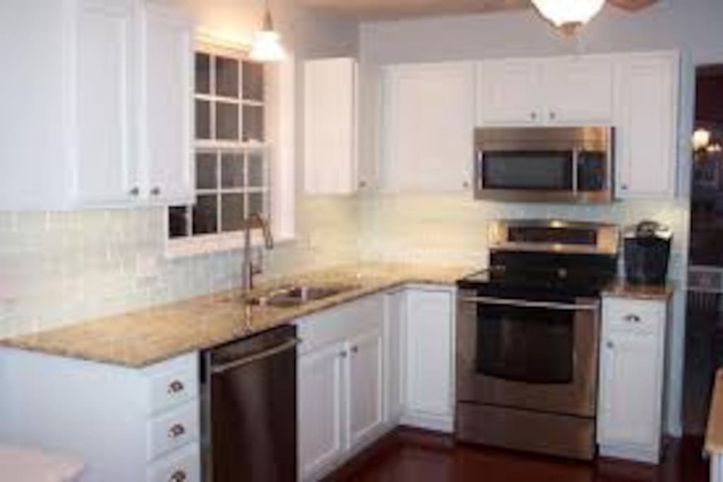 Eat in kitchen is Bright, contemporary and clean kitchen