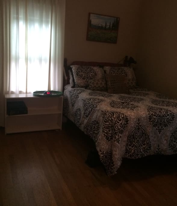 Comfortable double bed, quiet room at back of house.
