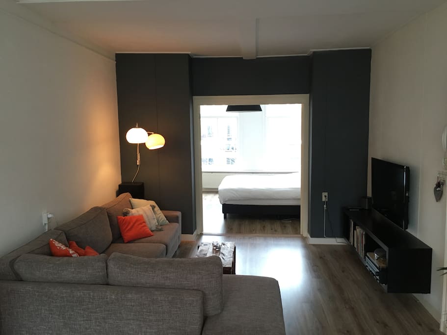 The living room is large, light and cosy.