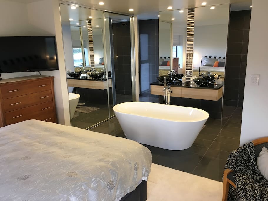 Open ensuite with beautiful vanity with dual basins