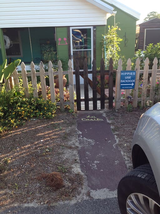 Front door and walkway. Parking out front.