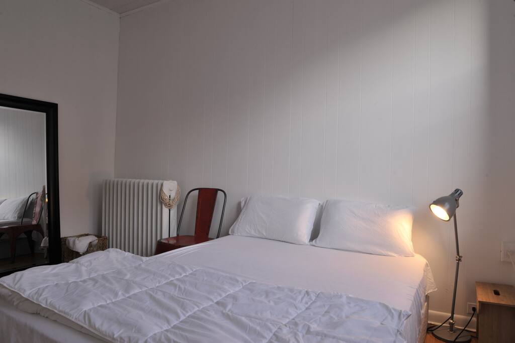 Clean queen size mattress, a flat bed sheet, a fitted sheet, two pillow cases and a comforter with a duvet cover. (Color varies)