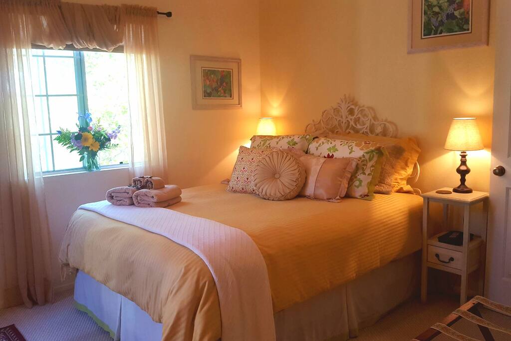 Cozy comfy queen size memory foam mattress top, goose down comforter, tons of pillows & extra blankets!