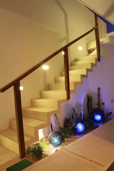 Exterior staircase to master room upstairs, also exterior acces to full bathroom from terrace and pool.