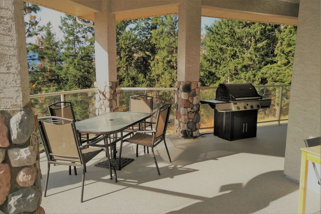 Enjoy an outdoor barbecue on the large covered deck.