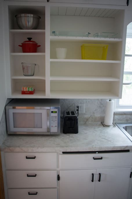 Brand new microwave, toaster, and cooking tools/dishes