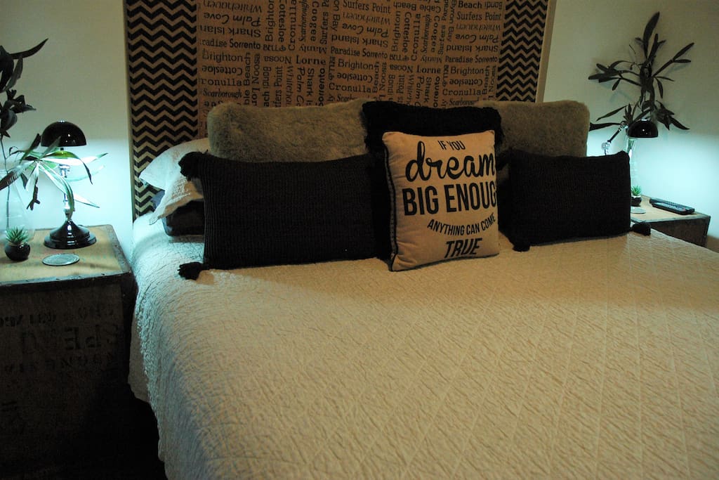 Comfy King sized bed with quality linen.