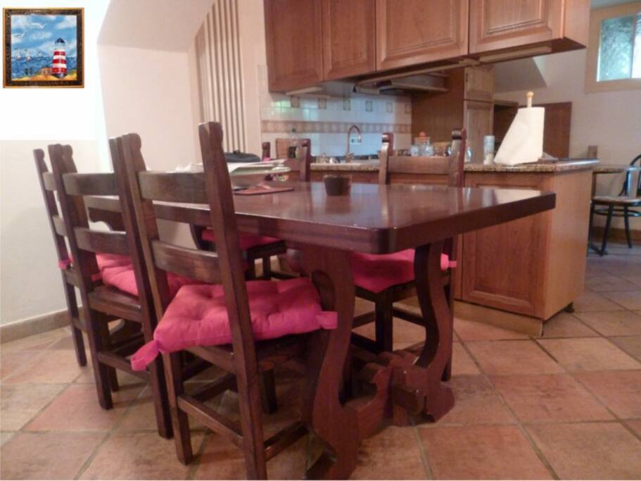 zona pranzo con cucina
