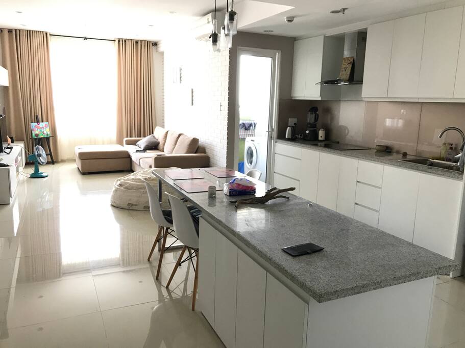 View from the apartment’s entrance: kitchen and living room