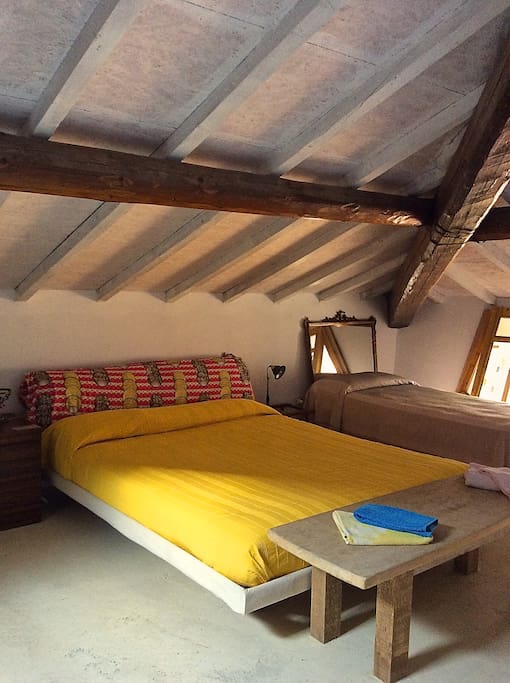 second floor open space double bed and single bed