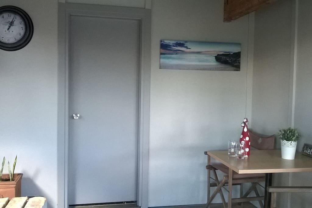entrance to the unit and cosy corner to enjoy your coffee in the morning
