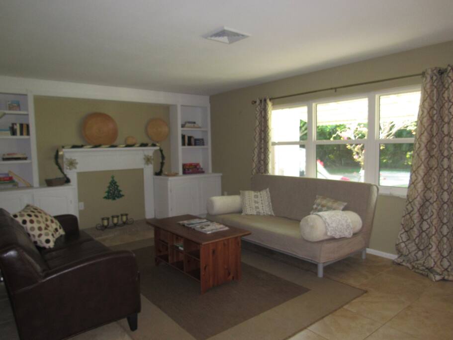 Living Room with Sleeper Sofa and new windows