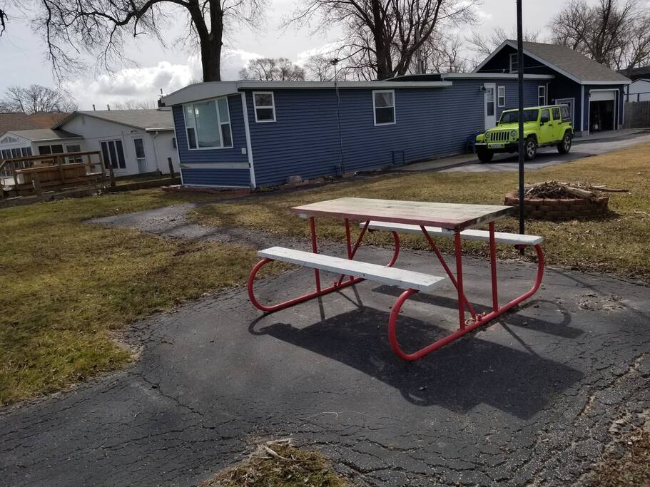Outside picnic table, firepit