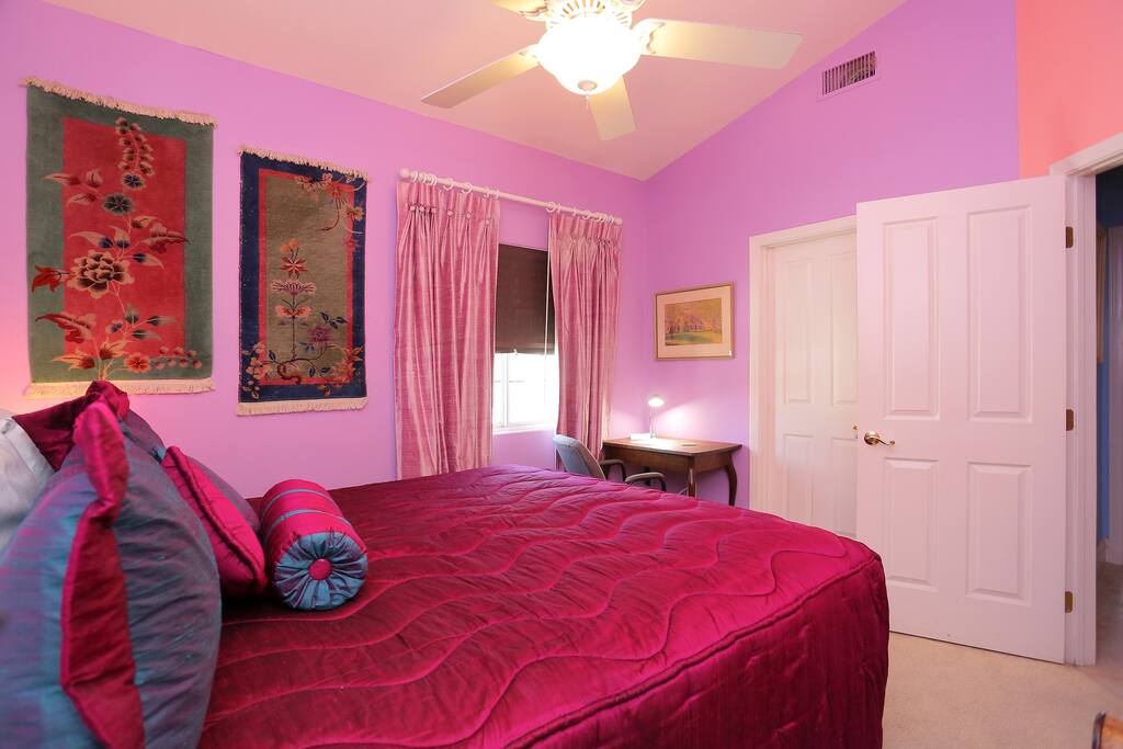 Private bedroom looking toward the window and desk