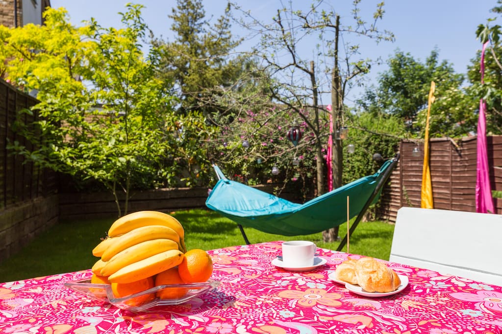A help yourself breakfast of tea coffee, pastries, cereal, yogurt and fruit.