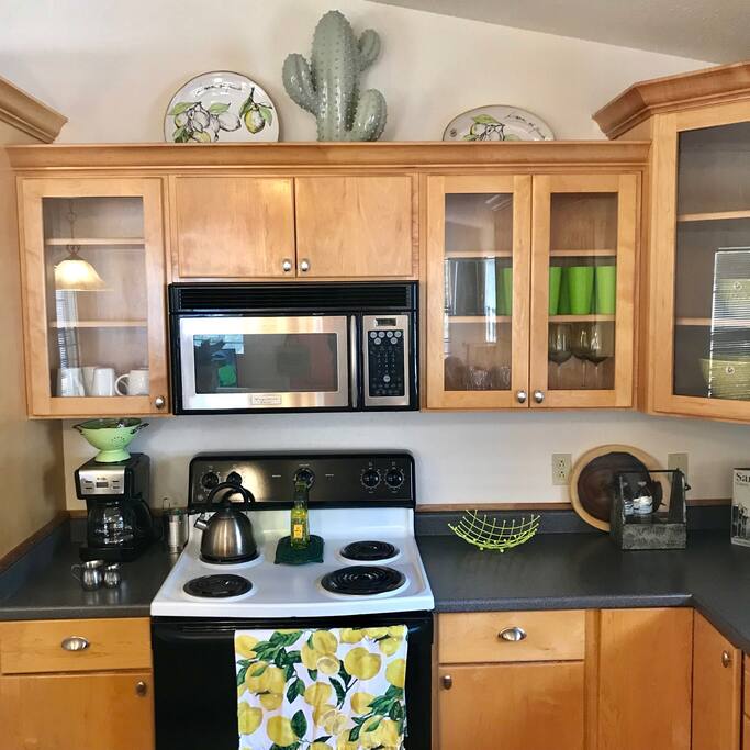 Kitchen with fully stocked coffee and tea
