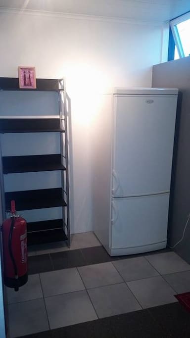 private fridge with a freezer below.