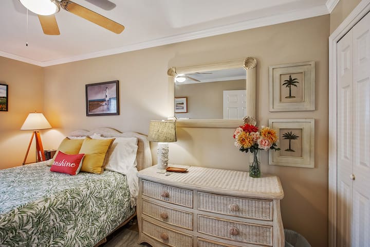 Relaxing second bedroom has a queen size bed.