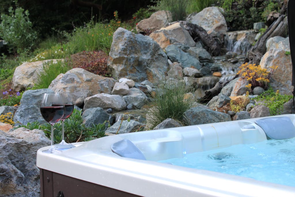 Hot tub next to the waterfall