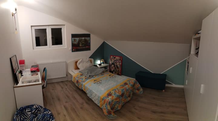 ห้องนอนพร้อมเตียงเดี่ยว 