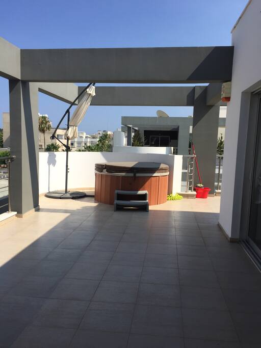 Veranda + jacuzzi