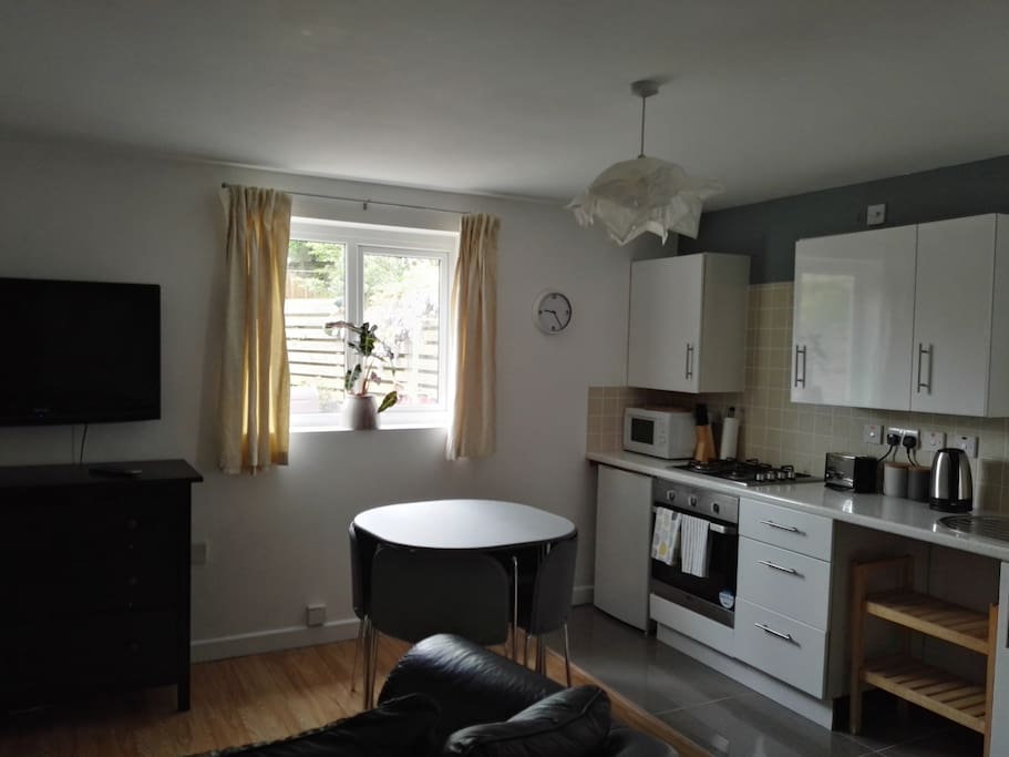 fully equipped kitchen with dining area